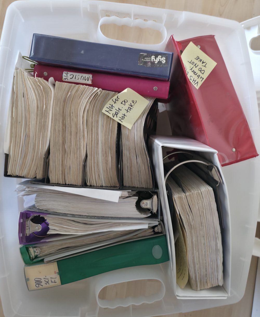 A tote full of catalog binders